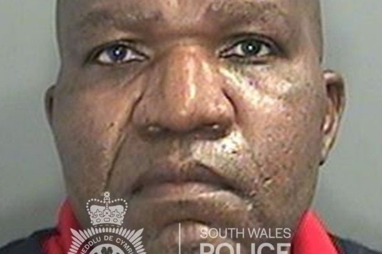 Dennis Mandzikwa, 52, raped a woman as she held her sleeping baby at her Cardiff home (Image: South Wales Police)