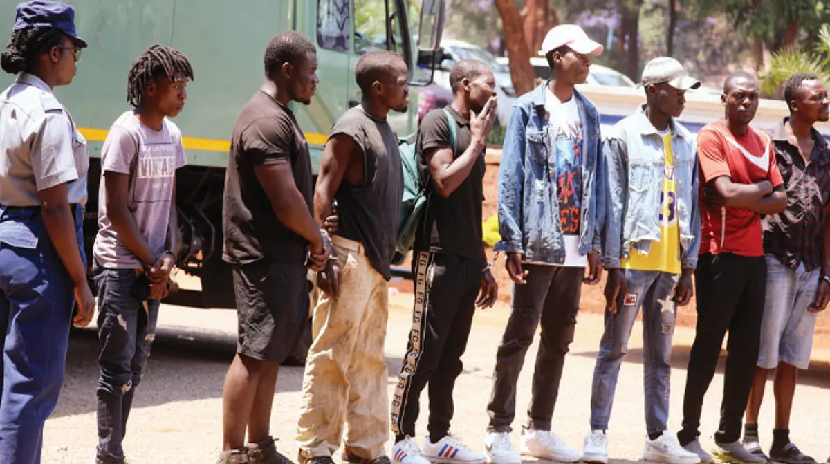 File picture of some of the 18 suspects behind the violence that rocked Mupedzanhamo Market in Mbare, Harare arrive at the Harare Magistrates Court in October 2022 (Picture: Lee Maidza)