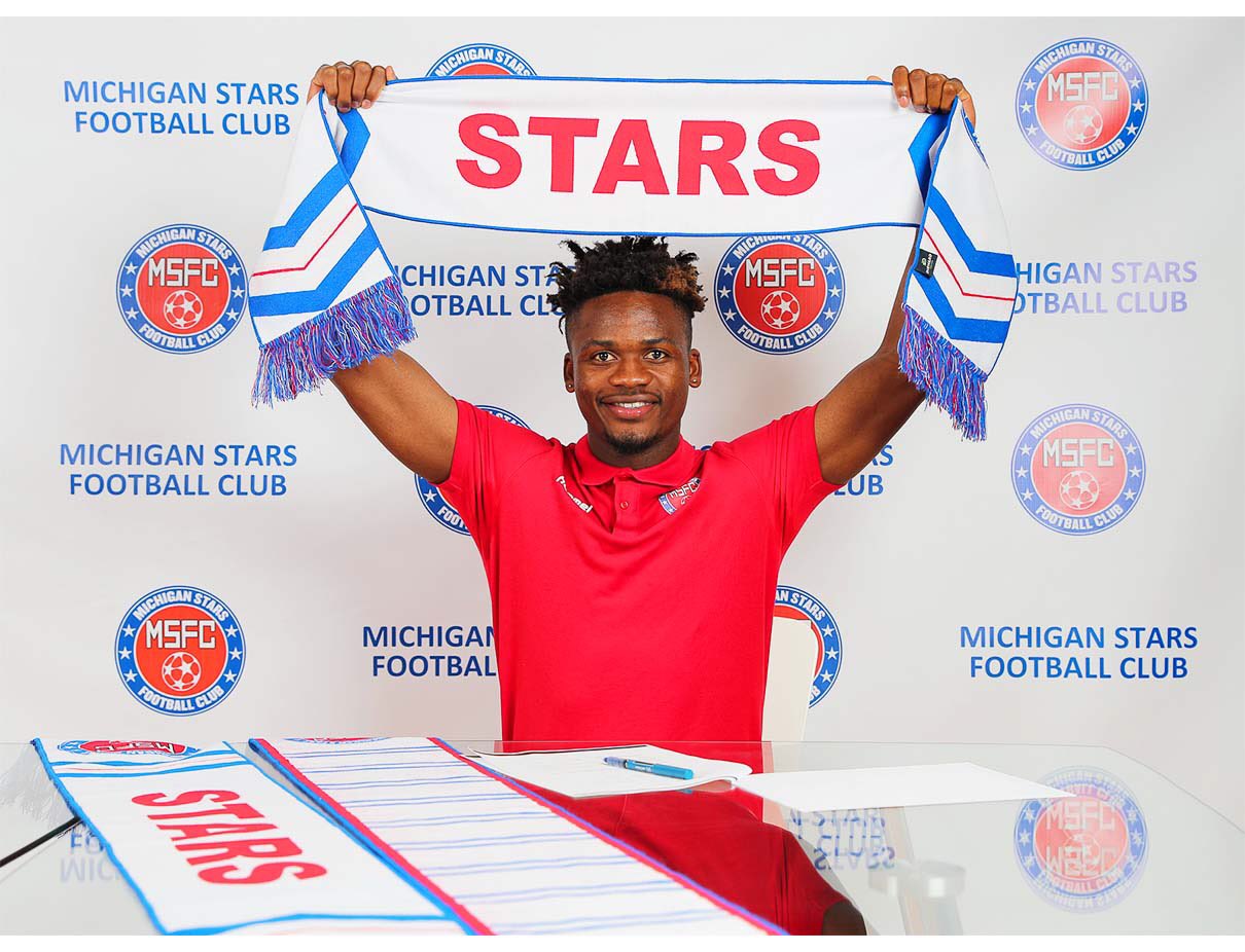 United States based former Zimbabwe Warriors goalkeeper Tatenda Mkuruva signing for Michigan Stars in the United States