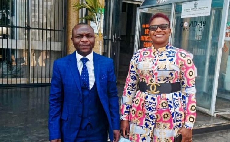 Harare teacher Edith Mupondi (right) with her lawyer Gift Mtisi (left) outside the Harare Magistrates Court on November 7, 2022