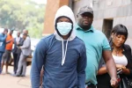 Levels back in court, remanded to next year in case involving Shashl Zimdancehall producer Tafadzwa Kadzimwe aka DJ Levels arrives at the Harare Magistrates Court accompanied by DJ Fantan (in shorts) to face allegations of raping singer Shashl. The charges were later amended — Picture: Lee Maidza via The Herald)