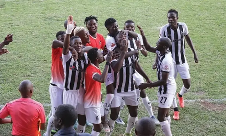Highlanders defender Peter Muduhwa celebrates with his teammates after scoring a header against FC Platinum (Picture via The Chronicle)