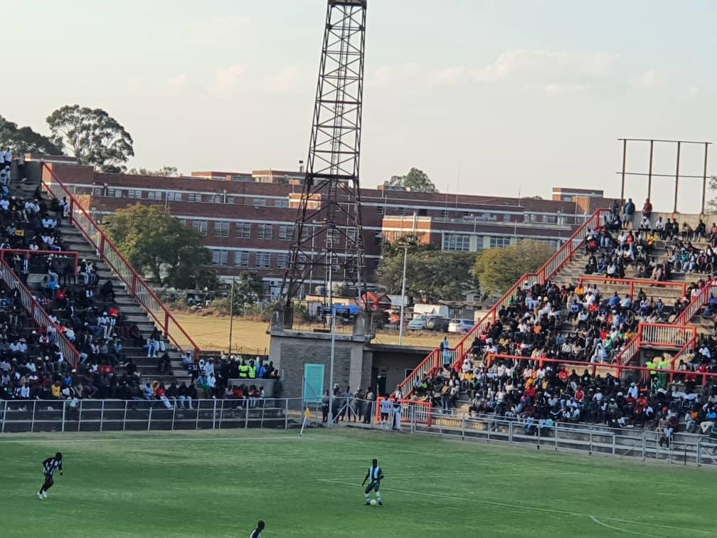 Mpilo Hospital in the background of the stand where Dynamos fan died (right)