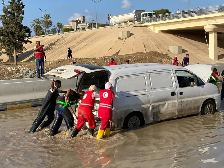 Members of Libya’s Red Crescent recovering vehicles from the floods [Handout/Libya Red Crescent]