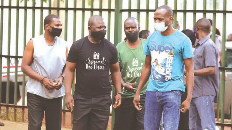 Some of the suspects behind the US$2,7 million ZB Bank cash-in-transit heist who have since been jailed for 10 years, appear at the Harare Magistrates Court in this file picture from January 2021