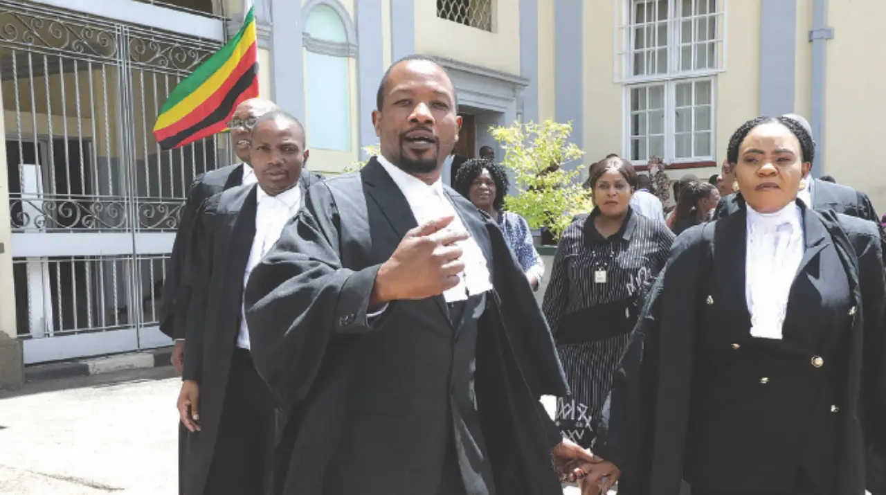 Gospel singer Ivy Kombo and her husband Pastor Admire Kasi leave the High Court in Harare after being admitted as lawyers in February 2023