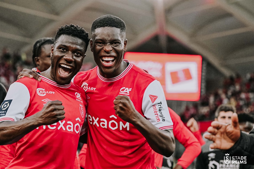 Stade de Reims Zimbabwean midfielder Marshall Munetsi (right) celebrates with his teammates (Picture via Stade de Reims)