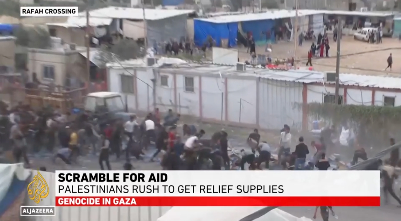 Starving Palestinians loot aid trucks as desperation mounts in Gaza’s Rafah (Picture via Al Jazeera)