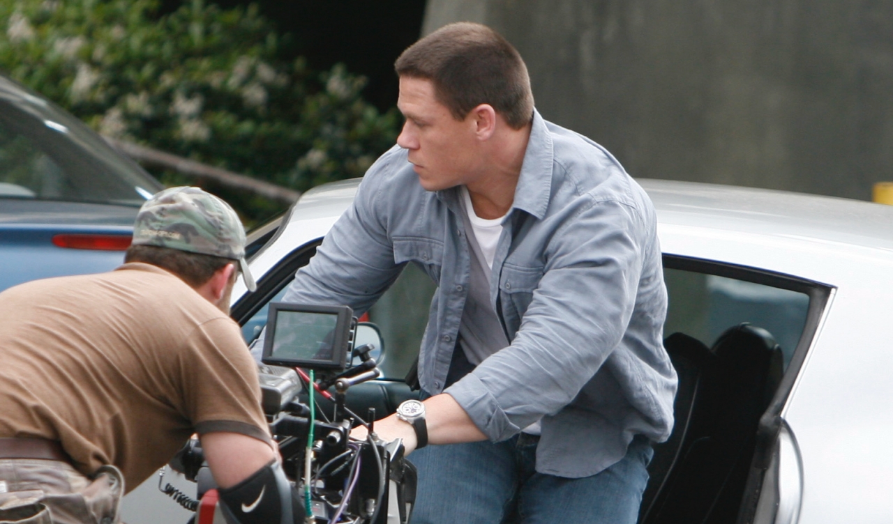 John Cena exits a vehicle during the filming of the new movie 12 rounds, Date 19 March 2008 (Picture via en, CC BY-SA 3.0 , via Wikimedia Commons)