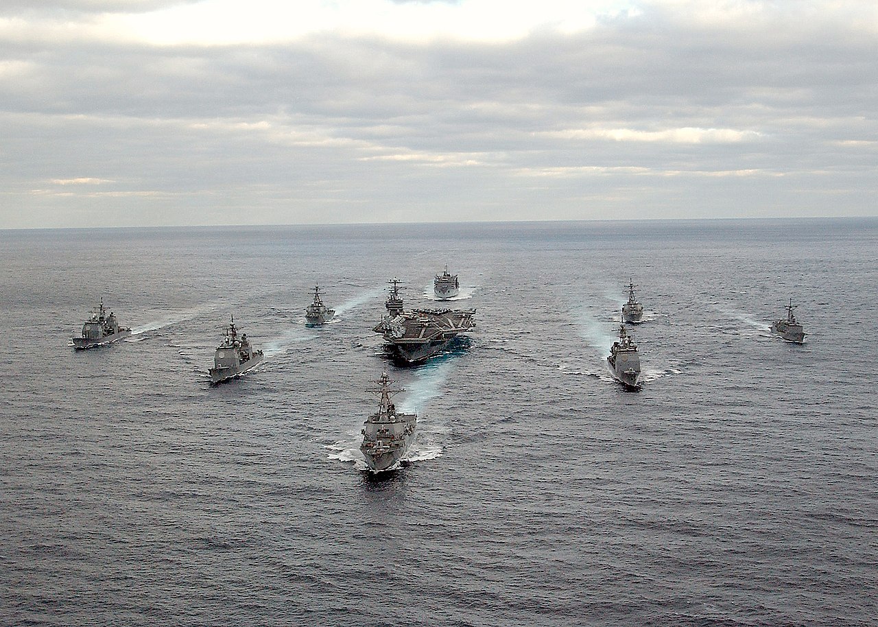 Atlantic Ocean (Nov. 30, 2003) -- USS George Washington (CVN 73) Carrier Strike Group formation sails in the Atlantic Ocean. (Picture via U.S. Navy photo, Public domain, via Wikimedia Commons)