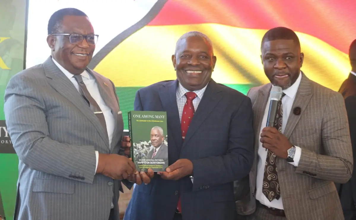 Vice President Constantino Chiwenga (left) and former CIO Director-General Happyton Bonyongwe (centre) during his book launch (Picture via ZBC)