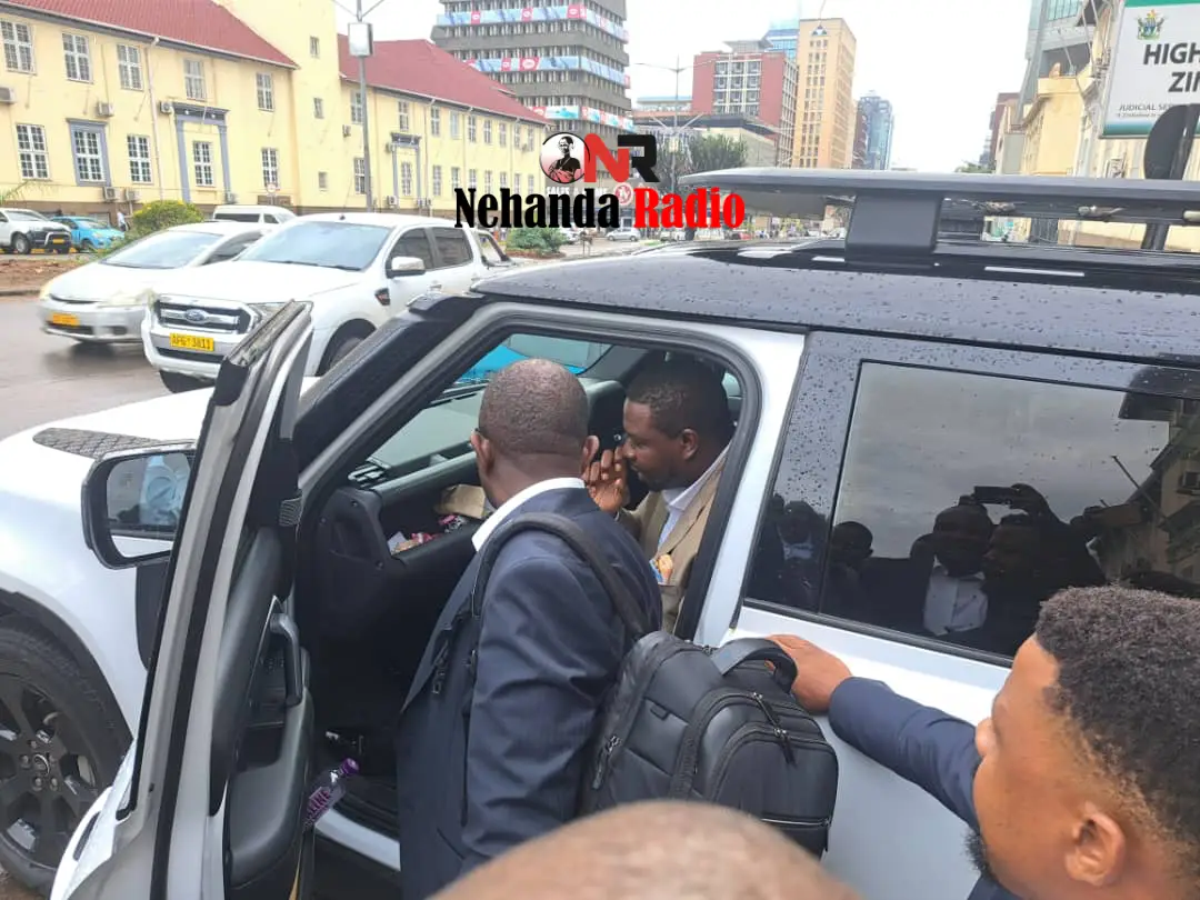Prophet Walter Magaya with his lawyer Advocate Thabani Mpofu outside the High Court in Harare where he was taking on the Zimbabwe Football Association (ZIFA) for disqualifying him from contesting their presidential elections (Picture via Nyashadzashe Ndoro for Nehanda Radio)