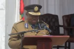 Zimbabwe police crack down on officers posting content in uniform Deputy Commissioner-General of Police (Crime and Operations), Learn Ncube addresses the crowd in Mbare, 01 September 2025 (Picture via X - Zimbabwe Republic Police)