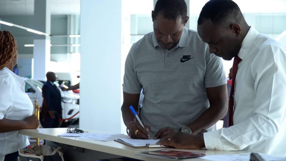 Controversial businessman Wicknell Chivayo has gifted veteran football coach Norman Mapeza a brand-new vehicle following his recent appointment as head coach of Scottland FC. (Picture via Facebook - Scottland FC)